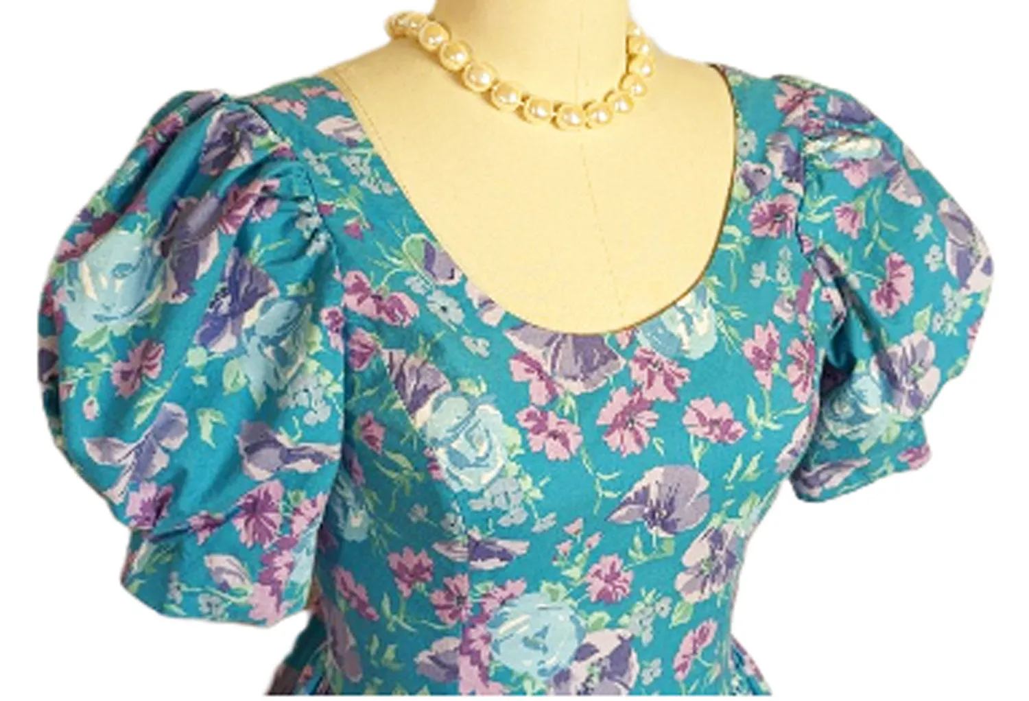 *   VINTAGE LAURA ASHLEY COTTON AQUA AND PURPLE FLORAL GORED GRAND SWEEP DRESS WITH BOW IN BACK MADE IN GREAT BRITAIN