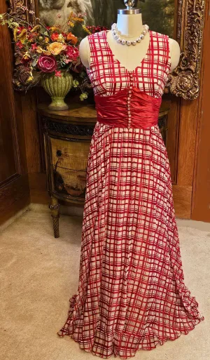 VINTAGE LATE 1960S EARLY 1970S RED AND WHITE PLAID PLEATED EVENING GOWN WITH RUCHED CUMMERBUND & PEARL BUTTONS